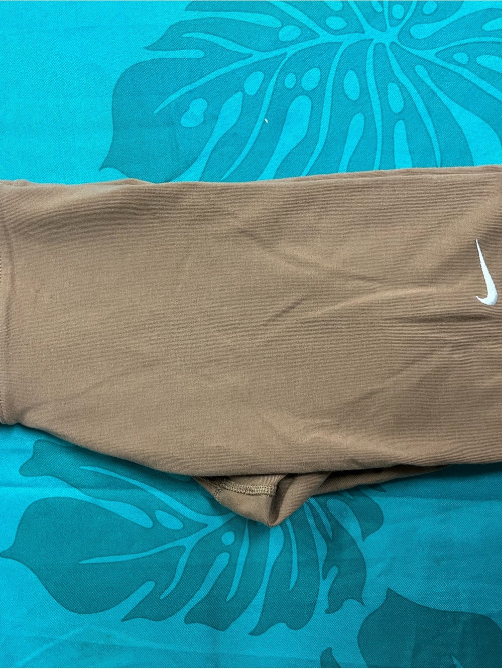 Nike women’s Tan Joggers with White Swoosh